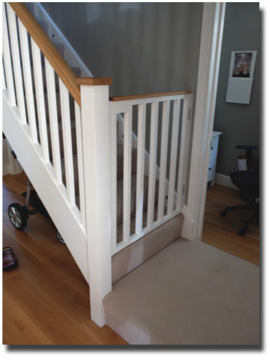completed stairgate - painted softwood with Oak top rail